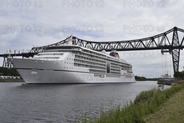 Cruise ship Europa 2 under the Rendsburg Bridge on the Kiel Canal, Schleswig-Holstein, Germany,
