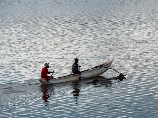 Small boat with two men, Kandalama Lake, Dambulla, Sri Lanka, Asia