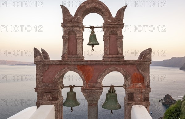 Old belfry wiith view of sea at dusk, Ia, Oia, Santorini, Greece, Europe