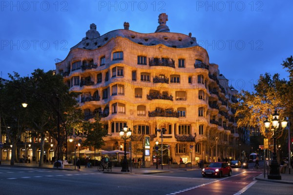BARCELONA, SPAIN, APRIL 17, 2019: Night view of famous Casa Mila house know as La Pedrera modernist