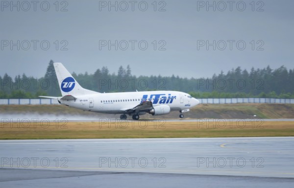 MINSK, BELARUS, JUNE 15, 2018: UTAir flight Boeing 737-500 plane taxi on runway in National Airport