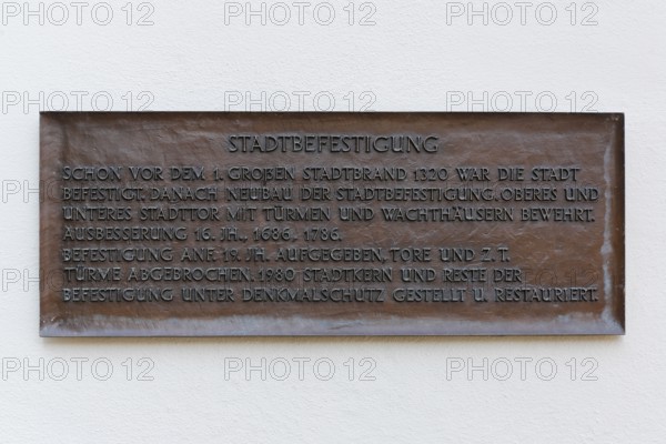 Sign at Werdenberg Castle, plaque, writing, letters, text on the town fortifications, Werdenberg