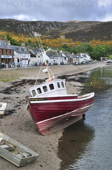 Fishing boat in the harbour of Ullapool, Highlands, Scotland, UK