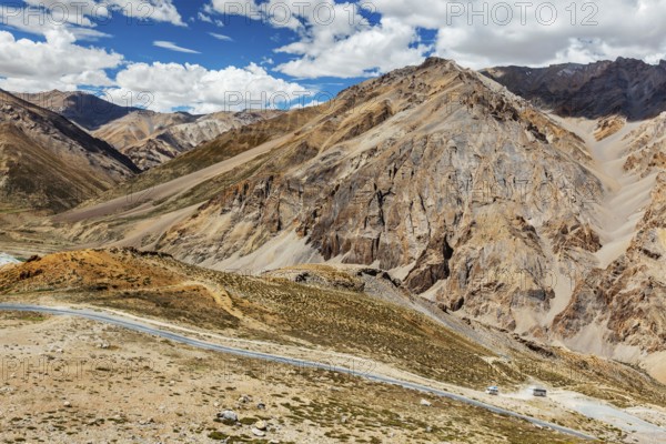 Manali-Leh highway in Himalayas with buses. Ladakh, India, Asia