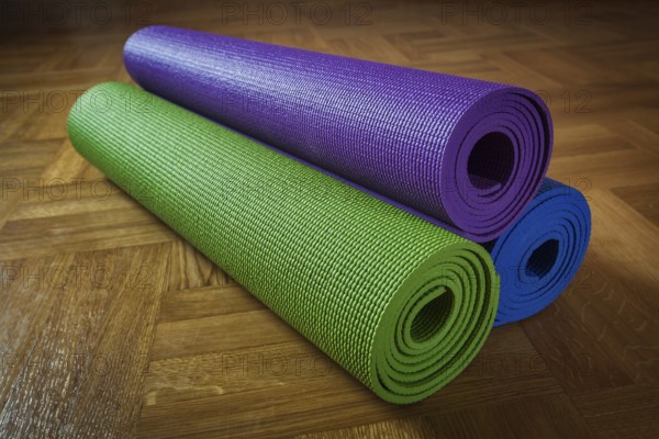 Yoga mats on wooden floor