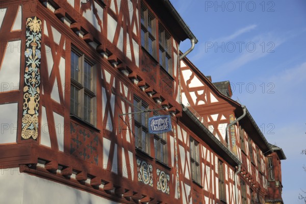 Historic Amthof and landmark, half-timbered house, nose sign, gallery, Bad Camberg, Taunus, Hesse,