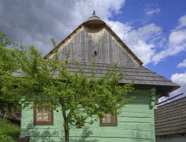 Colourfully painted wooden house in the village of Vlkolinec, Unesco World Heritage Site,