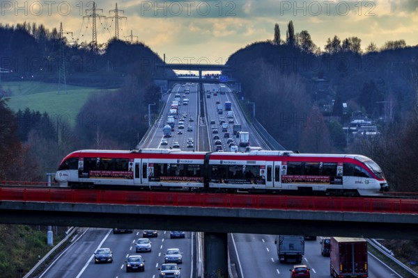 A3 motorway between Düsseldorf and Leverkusen, near Erkrath, railway bridge, Regio train