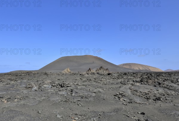 Mountain range with volcanoes in Timanfaya National Park, Lanzarote, Canary Islands, Spain, Europe