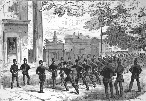 Uprising of 1867 by the Irish Republican Brotherhood. London police officers practising the use of