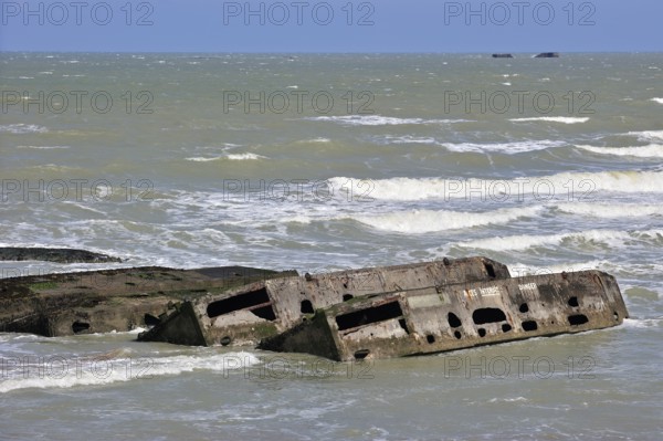 Concrete boxes, known as Phoenix Caissons, in the sea were used as breakwaters and to form an