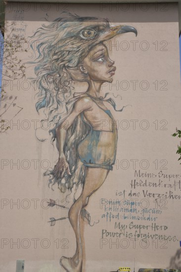 Mural My Superhero Power is Forgiveness by Herakut 2013, figure, eagle figure, graffiti, street