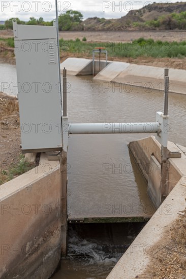 San Acacia, New Mexico, A gate on an irrigation canal allows water from the Rio Grande to be