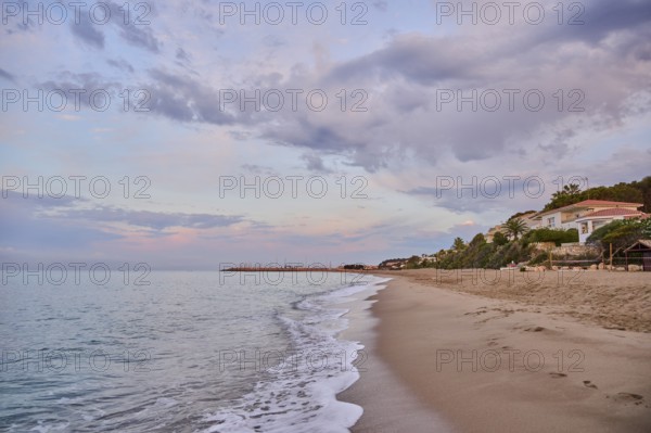 Sunrise with morning colors on a sandy beach near Tarragona, Catalonia, Spain, Europe