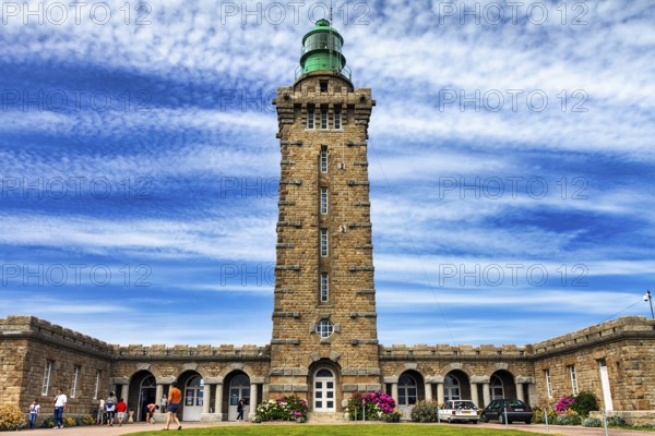 Cap Fréhel lighthouse with tourists, Emerald Coast, Brittany, France, Europe