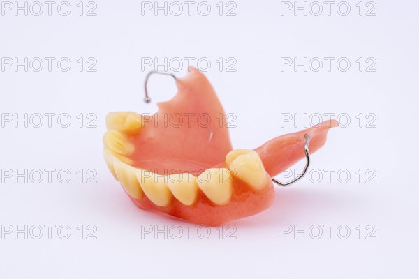 Removable denture of an upper jaw, denture, dental prosthesis, dentist