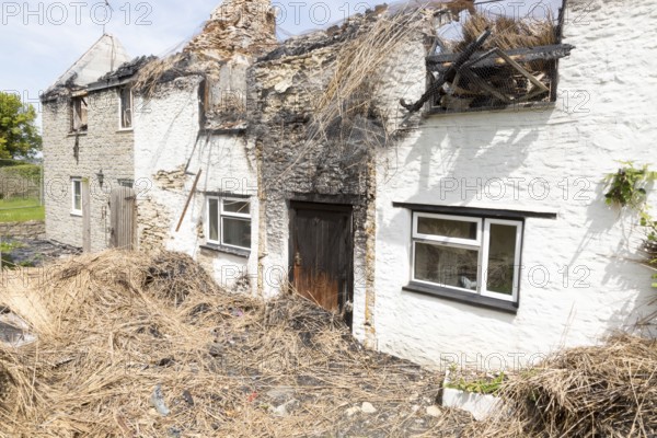 Country cottage homes burnt out destroyed by fire left in ruins, Redlynch, near Bruton, Somerset,