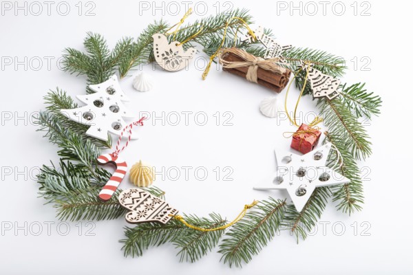 Christmas or New Year wreath composition. Decorations, stars, bells, fir and spruce branches, on