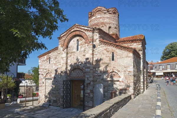Old Byzantine church with characteristic brick architecture and small windows, Church of St John