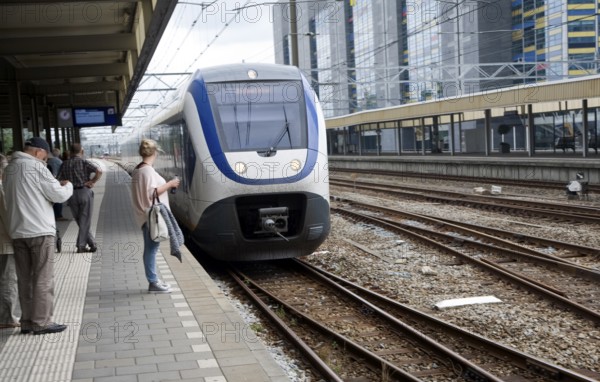 Intercity train to Den Haag Centraal, arriving at platform Leiden Central railway station,