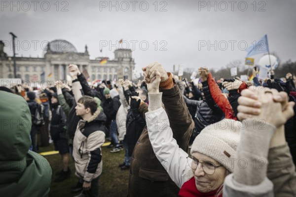 People hold hands at the large demonstration against the right in Berlin under the slogan We are