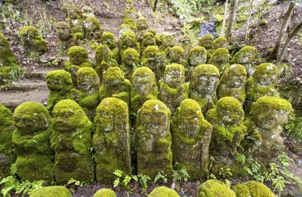 Moss-covered stone statues of rakans, the disciples of Buddha, Otagi Nenbutsu-ji temple, Kyoto,