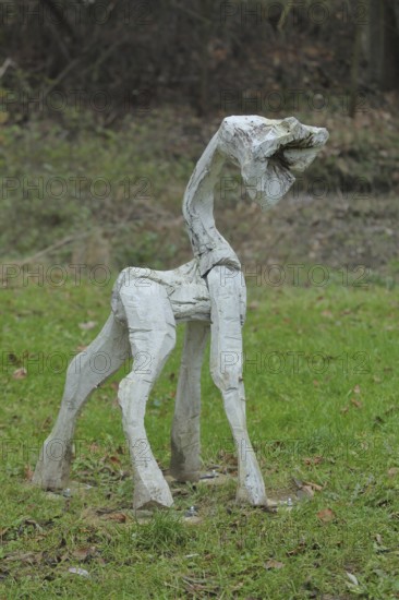 Sculpture flower animals by Achim Ripperger 2023, white animal figure with flower as head, young