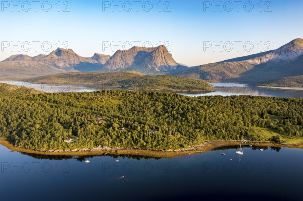 Aerial view over the fjord Efjord south of Narvik, seen at sunset, leisure boats anchor, holiday