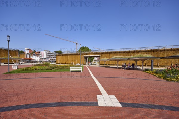 Park with lantern, bench, flowerbeds and graduation tower in Bad Salzuflen, Lippe district, North