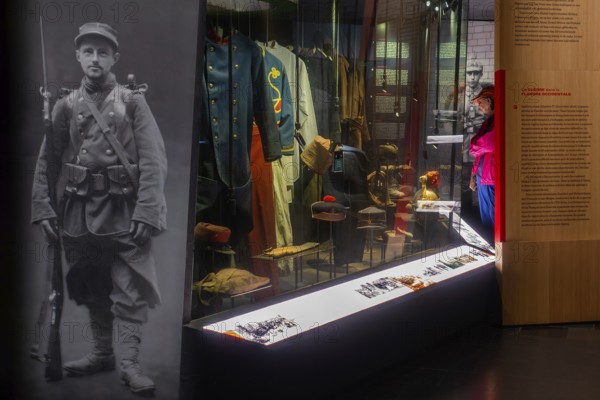 WWI uniforms on display in the In Flanders Fields Museum about World War One at Ypres, Ieper, West