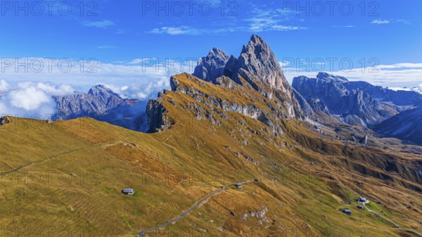 The Sas Rigais and Furchetta peaks of the Odle Group, drone shot, Val Gardena, Dolomites,