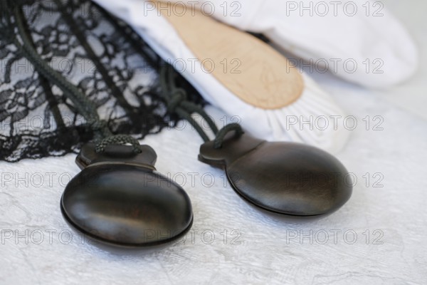 Castanets, wooden rattles, percussion instrument, Spanish musical instrument, back of ballet shoes,