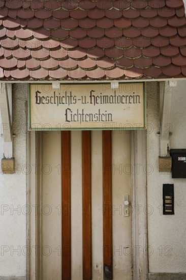 Handwritten sign, writing, Lichtenstein History and Local History Society, entrance, front door,