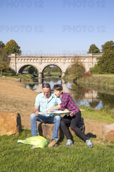 Hikers in the Steverauen Olfen, Alte Fahrt canal bridge, of the Dortmund-Ems Canal, a renaturalised