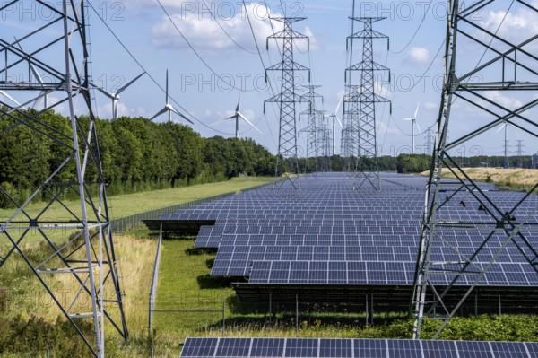 High-voltage power line route, the space underneath is used for a solar park over 5 km long, behind