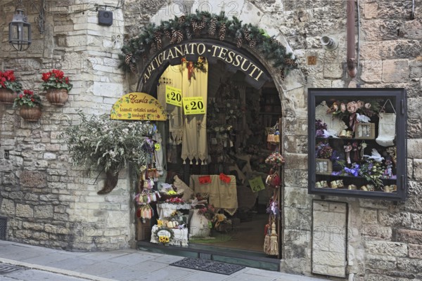 Arts and crafts, souvenir sales in Assisi, Umbria, Italy, Europe