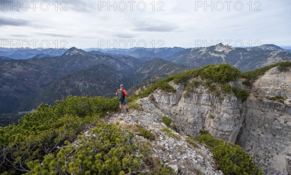 Hiker on the Schinder, Tegernsee mountains in the Mangfall mountains, Germany, Europe
