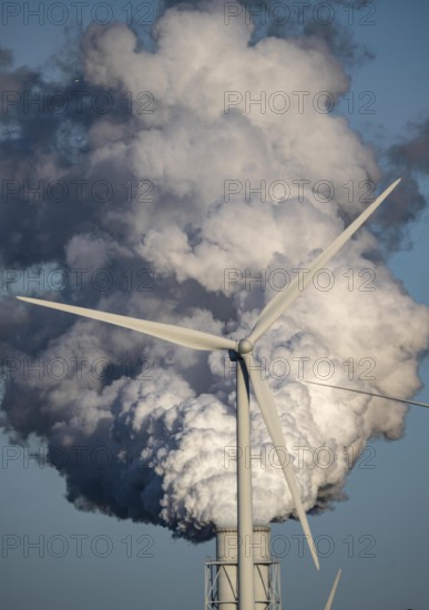 Chimneys, smoke plume of the RWE coal-fired power plant Eemshavencentrale, wind power plant, in the