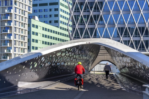 The Parkbruk, cycle and pedestrian bridge in the city centre of Antwerp, crosses a multi-lane city