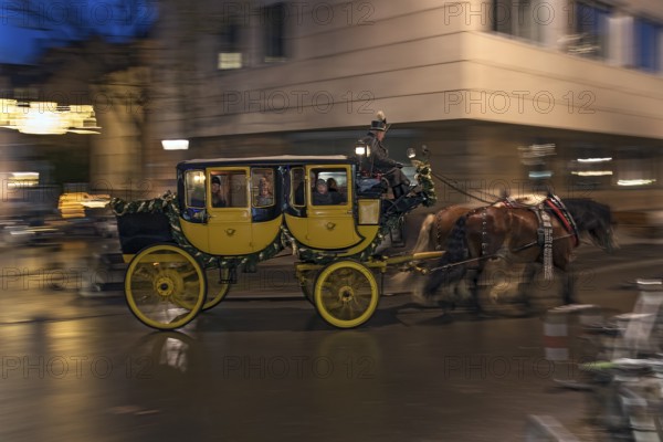 Historic horse-drawn stagecoach with visitors from the Christkindlesmarkt, Nuremberg, Middle