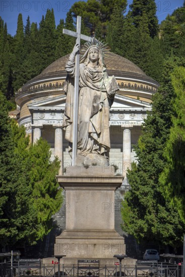 Large statue of a saint at the entrance to the Staglieno Monumental Cemetery, Cimitero Monumentale