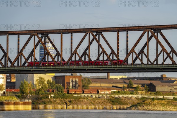 The railway bridge Duisburg-Hochfeld-Rheinhausen, over the Rhine, regional trains and many goods
