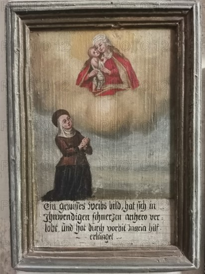 Votive pictures, votive tablets on the walls of the chapel of grace inside the church, pilgrimage