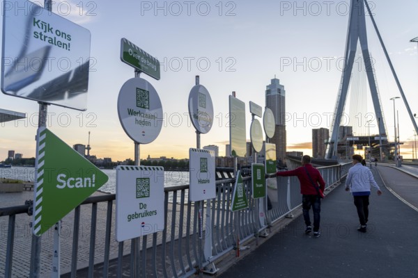 Information boards with QR code, on various topics, tourist information, at the Erasmus Bridge, on