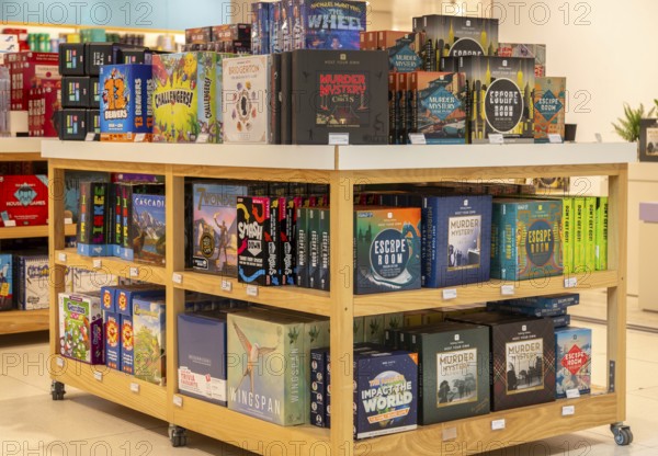 Shop display of board games inside John Lewis store, Cambridge, Cambridgeshire, England, UK