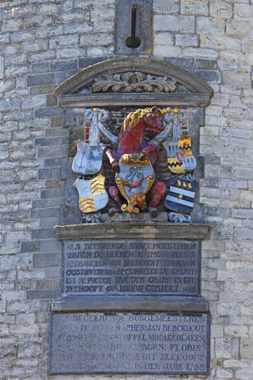 City coat of arms with unicorn on the historic Hoofdtoren defence defence tower in the harbour of