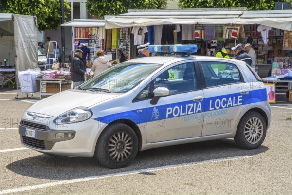 Police car at the market place in Policoro, Matera district, Basilicata, Italy, South Europe,