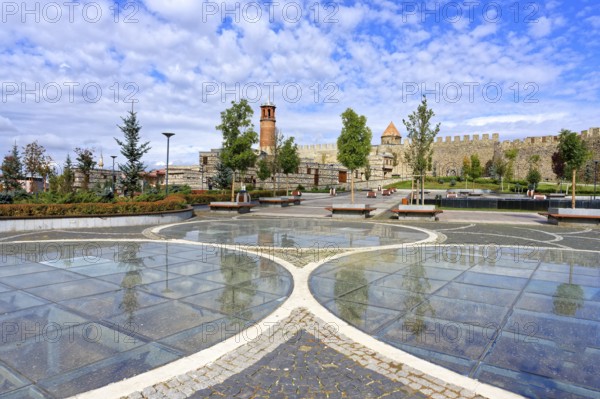 Reflections in the glass grounded Kale city park and Erzurum byzantine castle, Anatolia, Turkey,