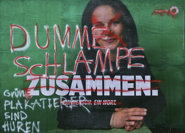 Denigration of a large poster for the 2025 federal election by the Greens with Annalena Baerbock,