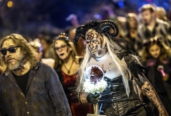 The Zombiewalk in Essen, on Halloween several hundred people, some dressed as scary zombies,
